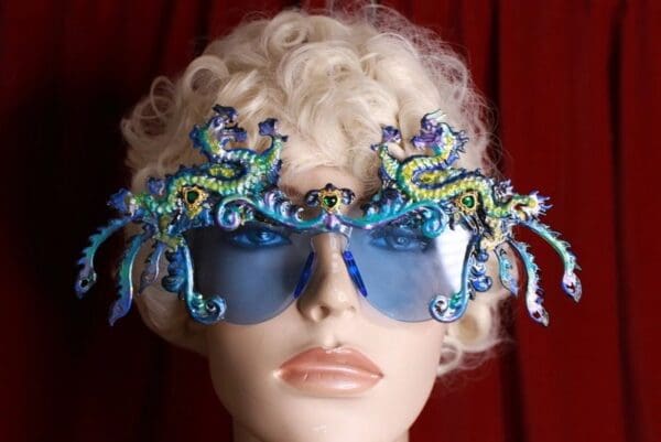 A woman wearing some fancy glasses with sea creatures on them