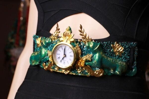 A close up of a clock on the arm of someone