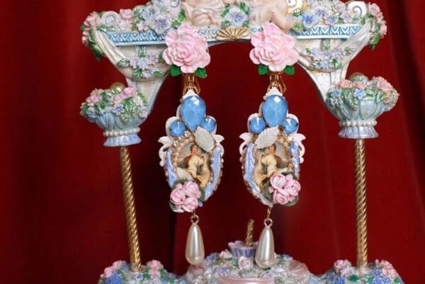 A close up of a pair of earrings