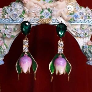 A pair of earrings hanging from the ceiling.