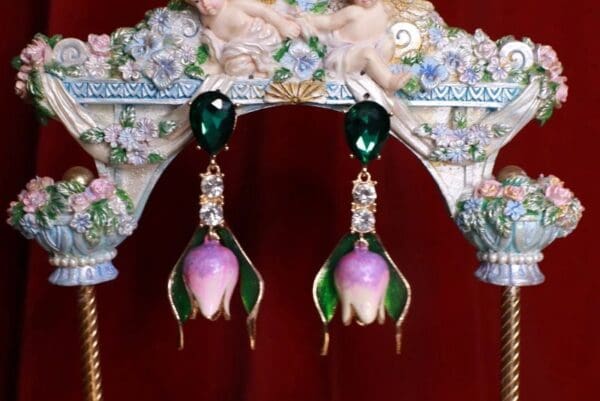 A pair of earrings hanging from the ceiling.