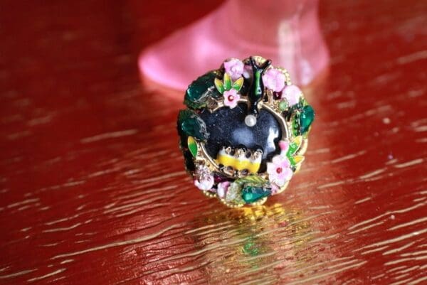 A close up of a ring on top of a table