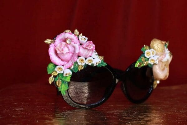 A pair of sunglasses with flowers on them.