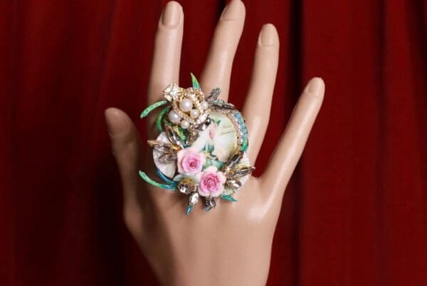 A hand with a ring on it's finger