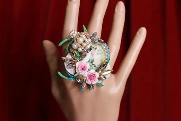 A hand with a ring on it's finger