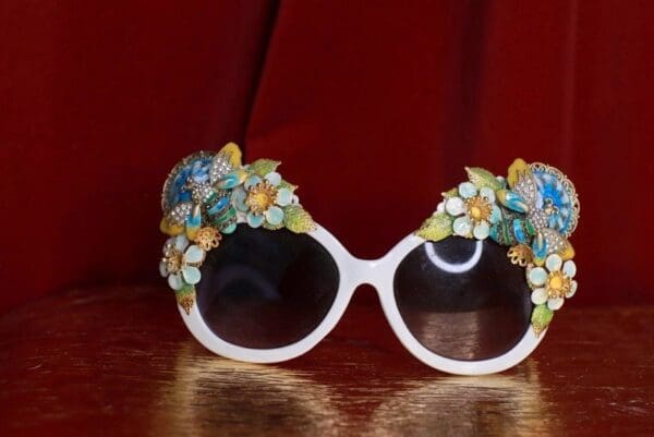 A pair of sunglasses with flowers on them.