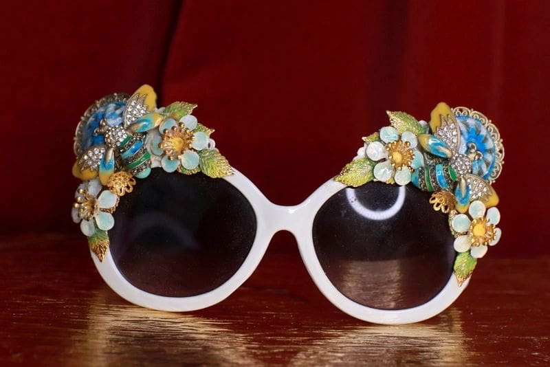 A pair of sunglasses with flowers on them.