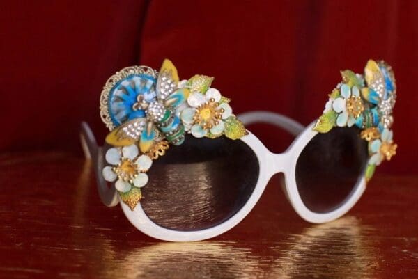 A pair of sunglasses with flowers on them.