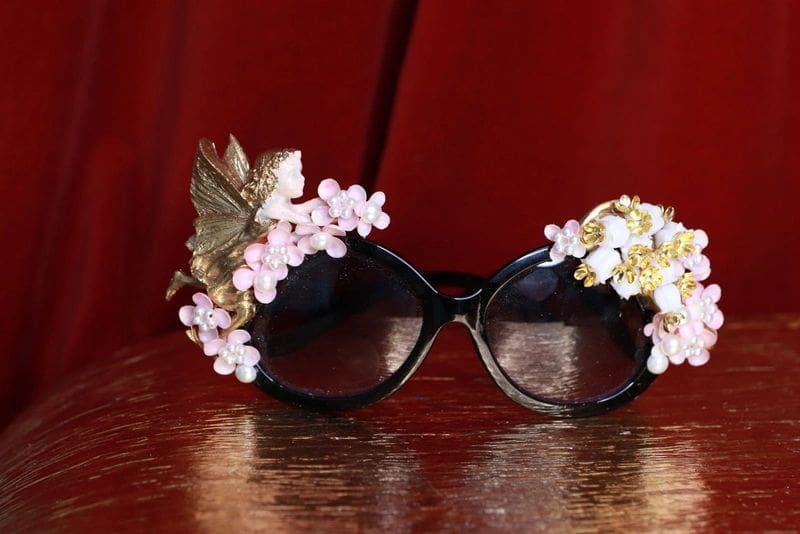 A pair of glasses with flowers on them