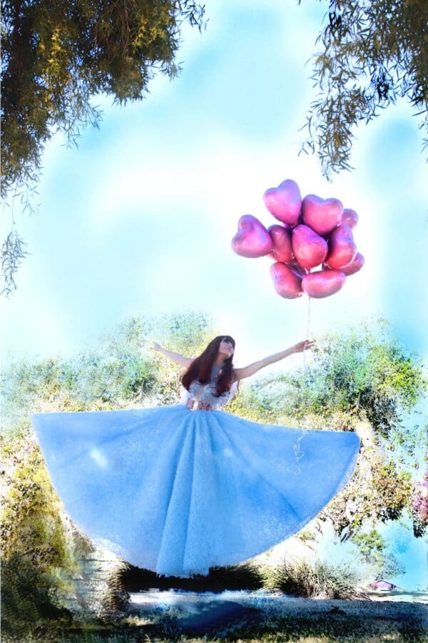 A woman in blue dress holding balloons and flying.