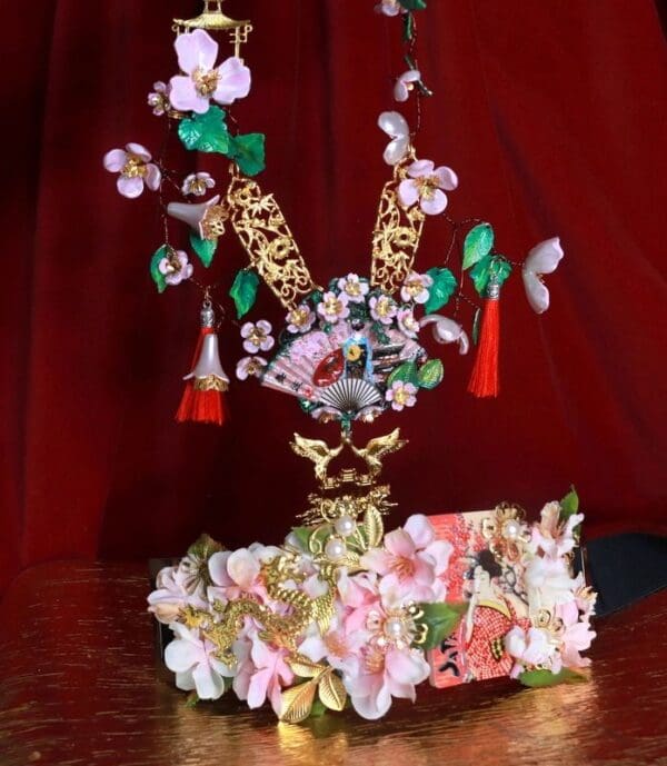 A flower arrangement in the shape of a vase.