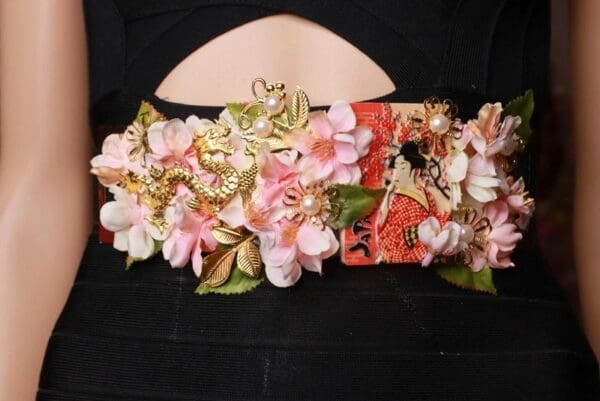 A close up of the flowers on a purse