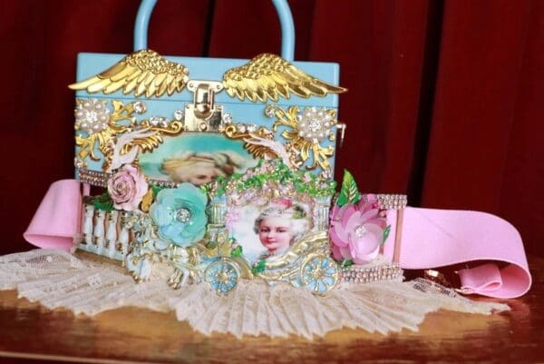 A purse with a picture of a woman on it.