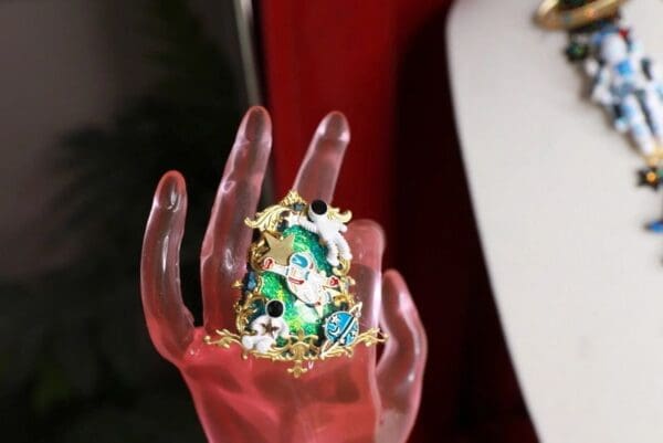 A hand holding something with some kind of object in it