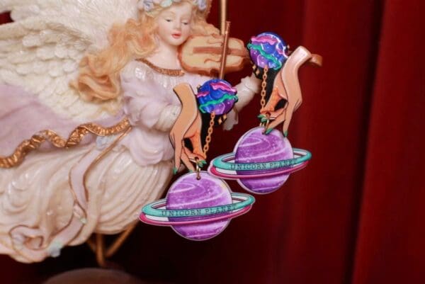 A pink and purple ornament hanging from the ceiling.