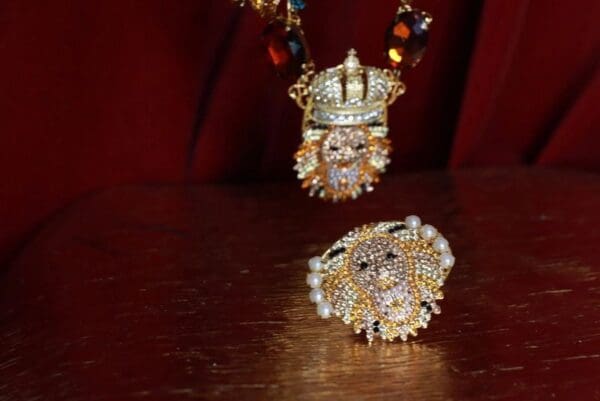 A close up of two jewelry items on a table