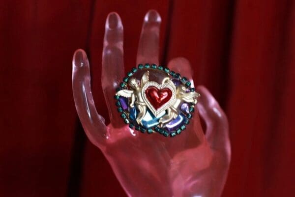 A hand with a ring on it's finger