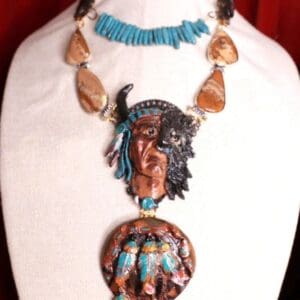 A necklace with an indian head on it