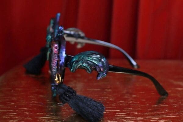 A close up of a dragon head on top of a table.
