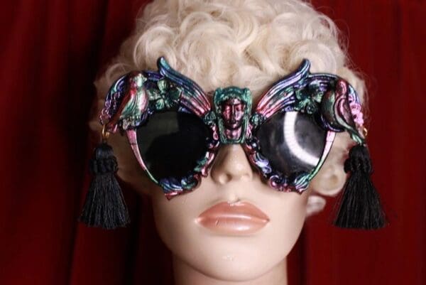 A blonde wig and some glasses on top of it