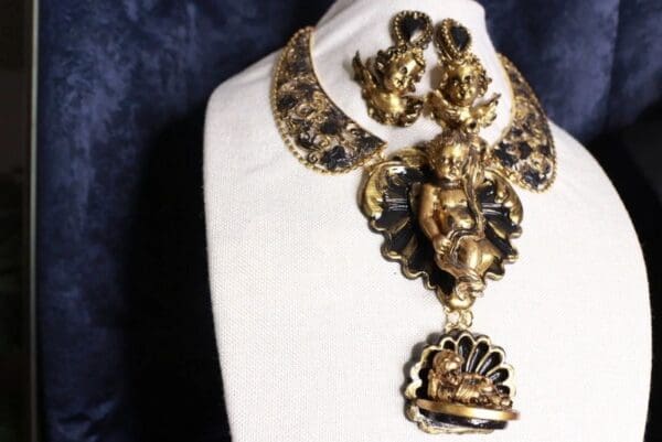A necklace with an ornate design on it.