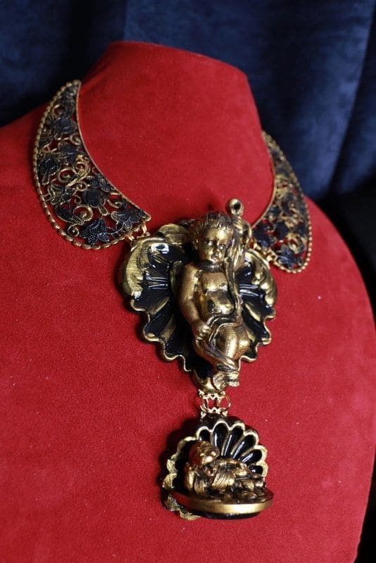 A necklace with an elephant head on it.