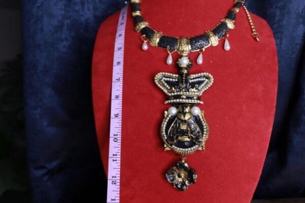 A necklace with a large pendant on it