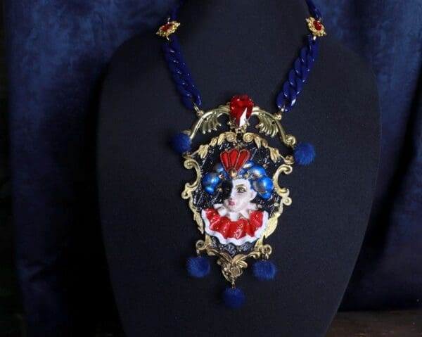A necklace with a face on it