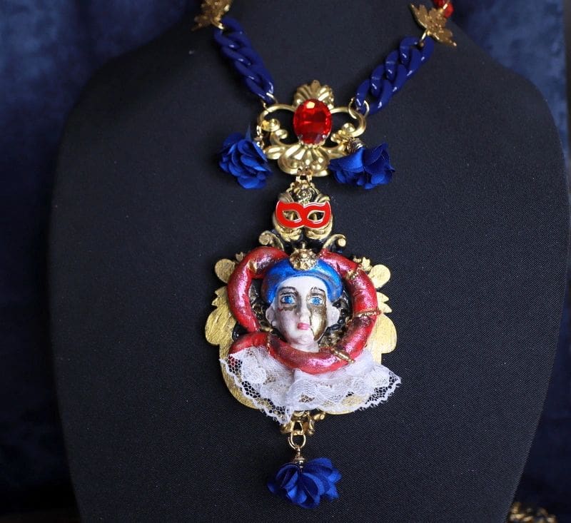 A necklace with a picture of a woman on it.