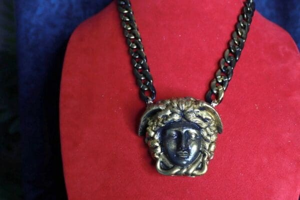 A necklace with a face on it