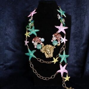 A necklace with stars and chains on it