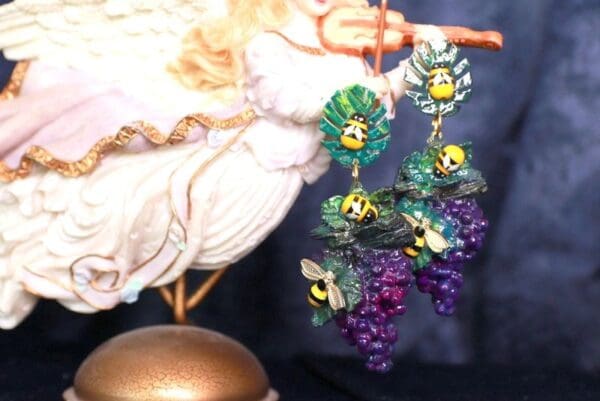 A close up of a pair of earrings