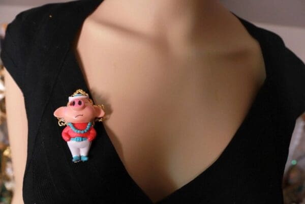 A close up of a person wearing a brooch
