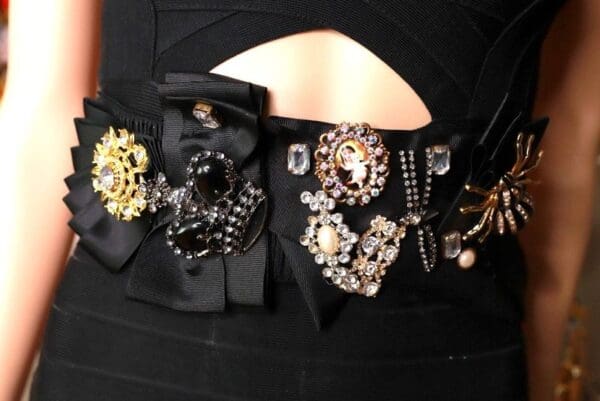 A close up of the back of a woman 's dress