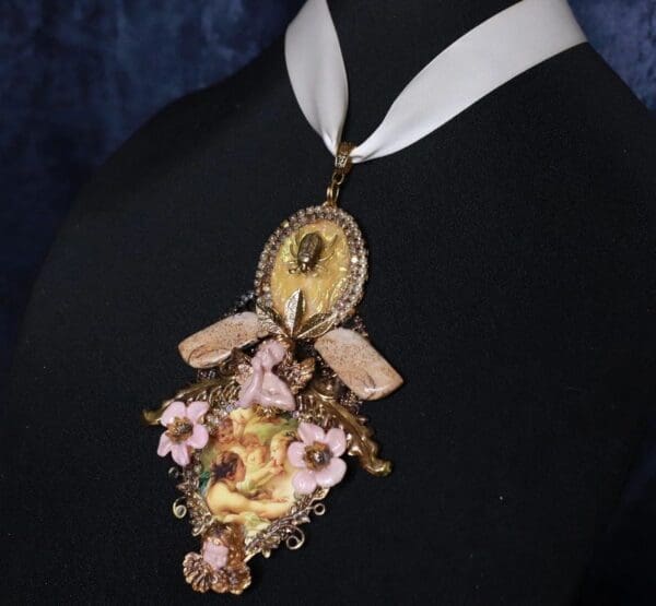 A woman wearing a necklace with flowers and a clock.