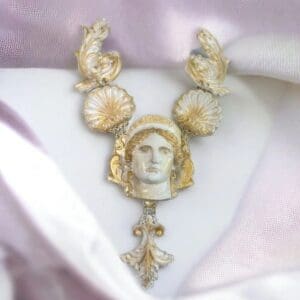 A necklace with a face on it