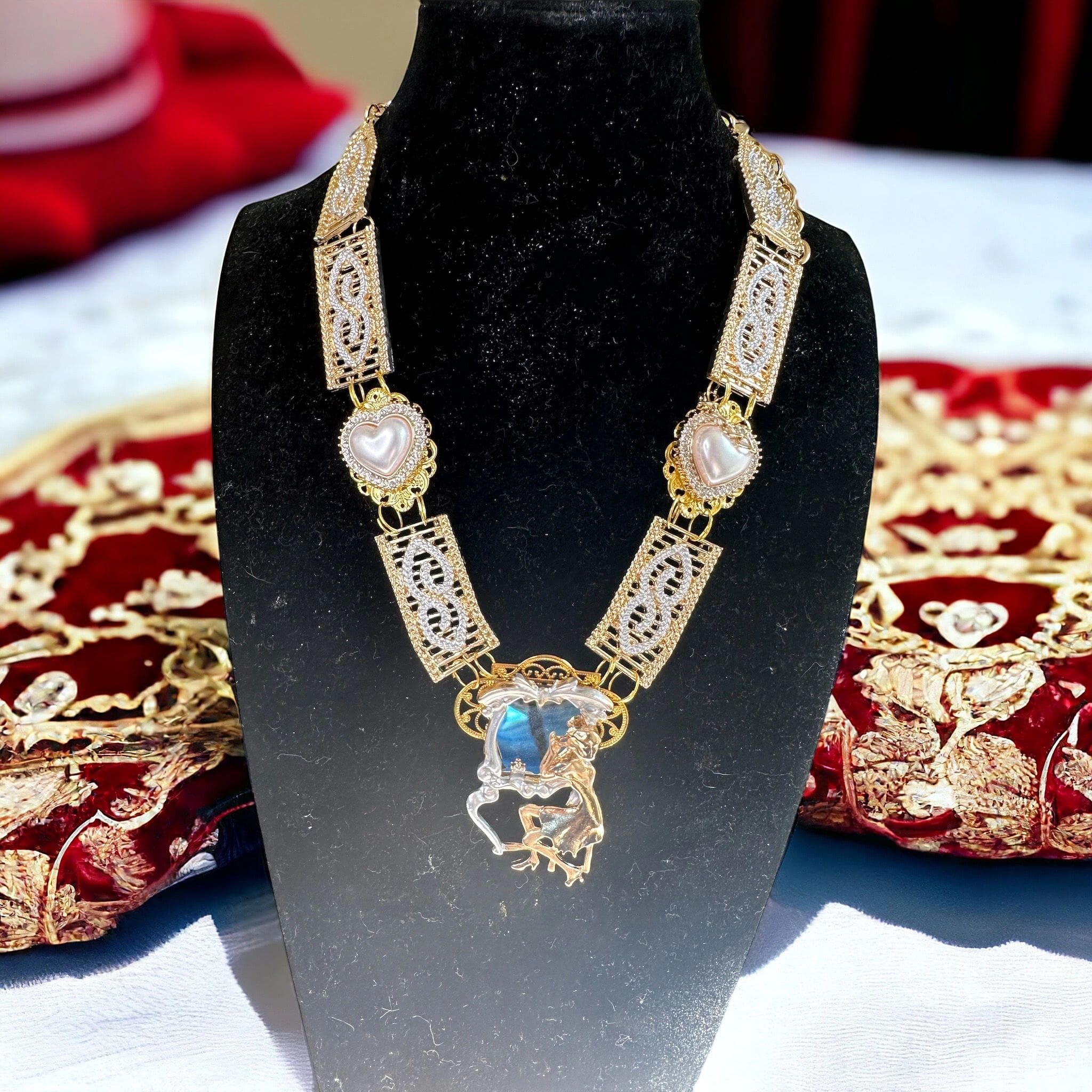 A necklace is displayed on the table.