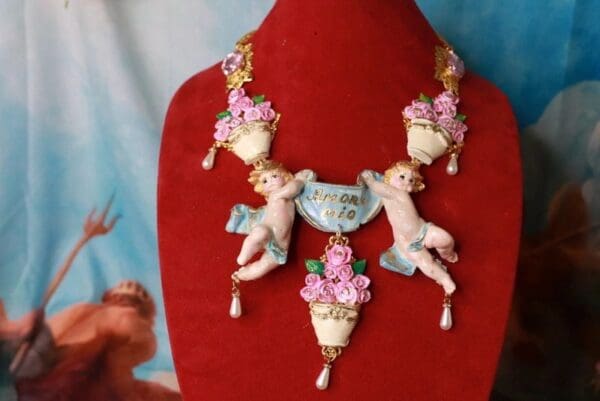 A red display with a necklace on it