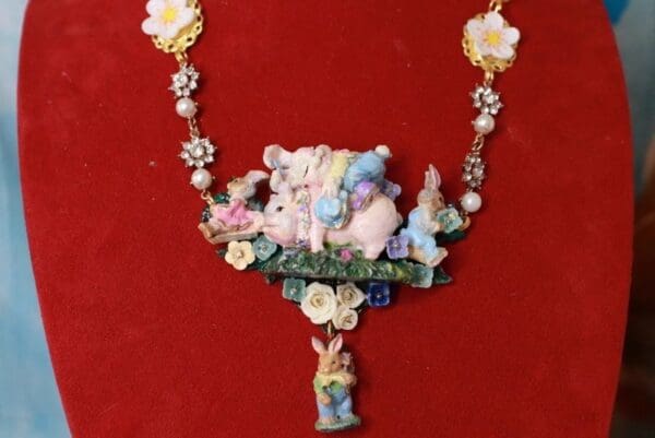 A necklace with some figurines on it