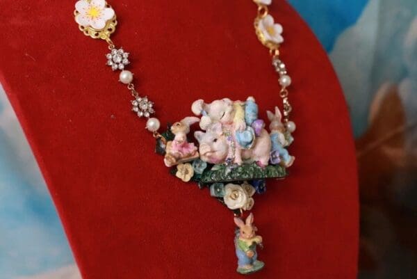 A necklace with a lot of figurines on it