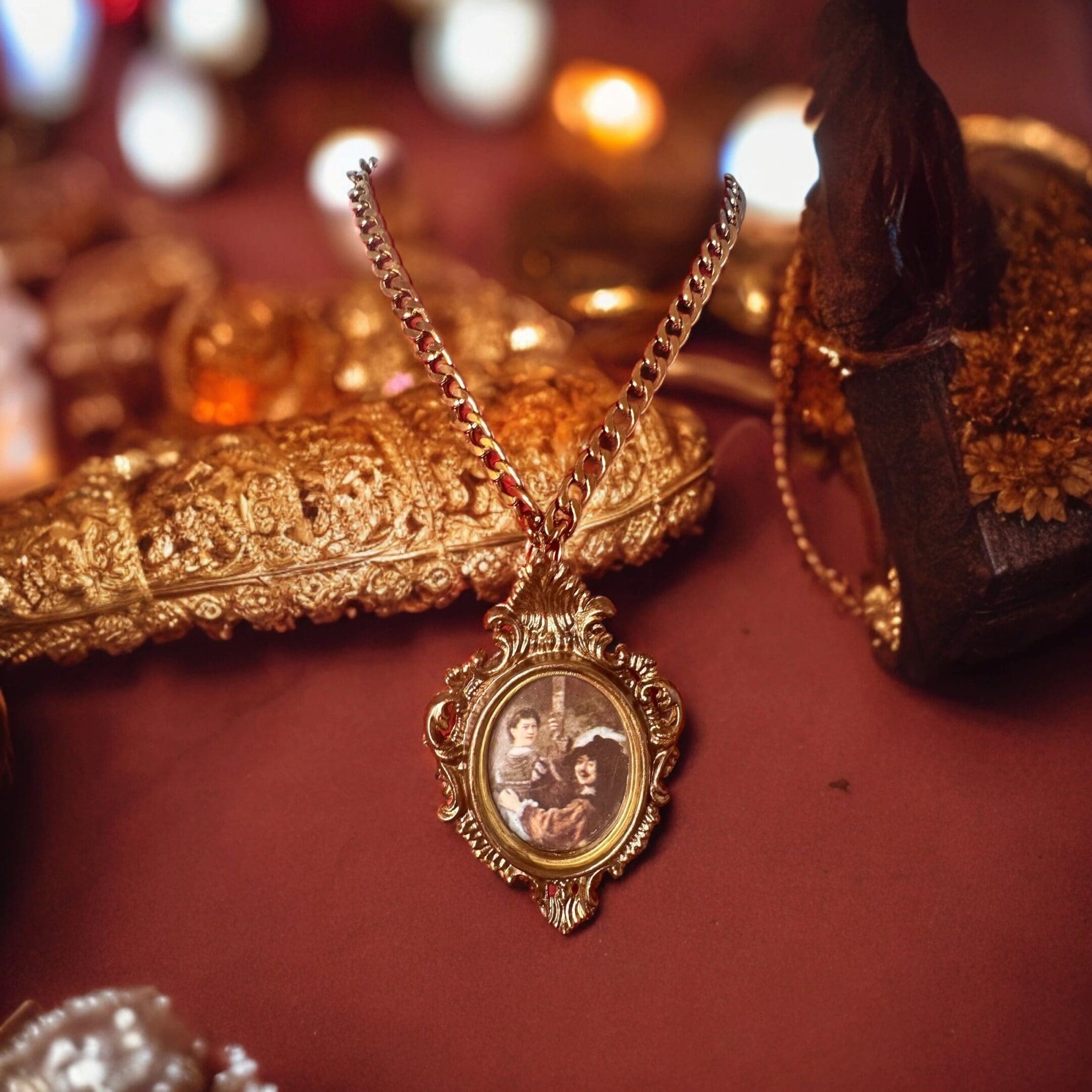 A necklace with a picture of a cat on it.