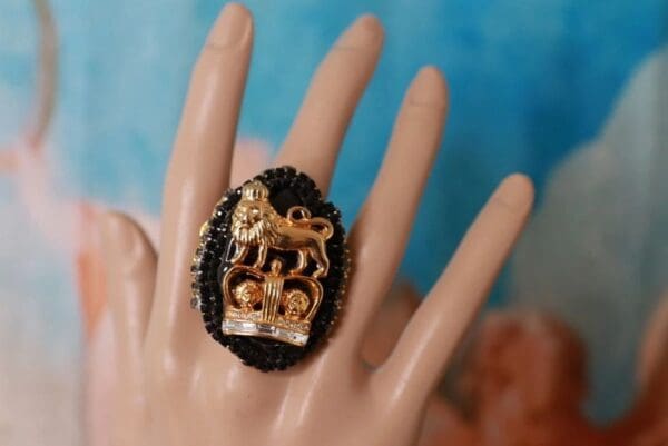 A hand with a ring on it's finger