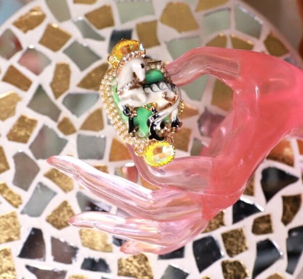 A close up of a person holding something in their hand
