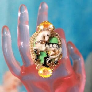 A hand with a ring on it's finger
