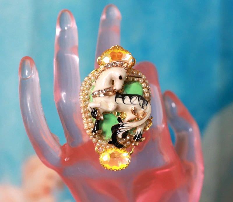 A hand with a ring on it's finger