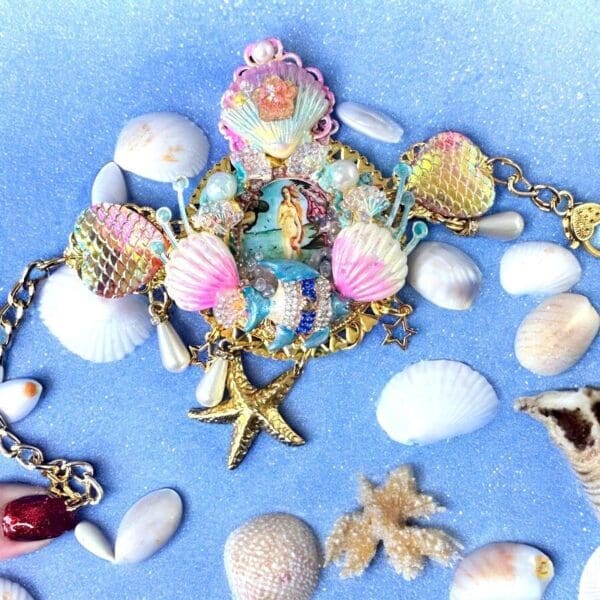 A blue background with shells and other things