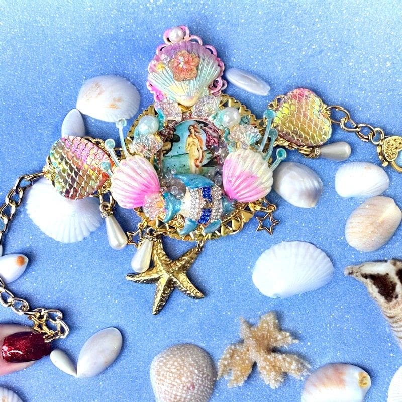 A blue background with shells and other things