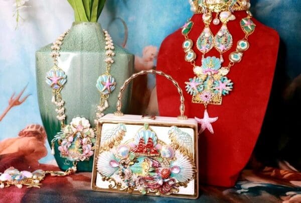 A close up of a purse and other accessories