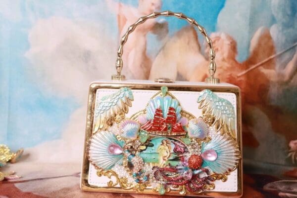 A purse with some kind of artwork on it