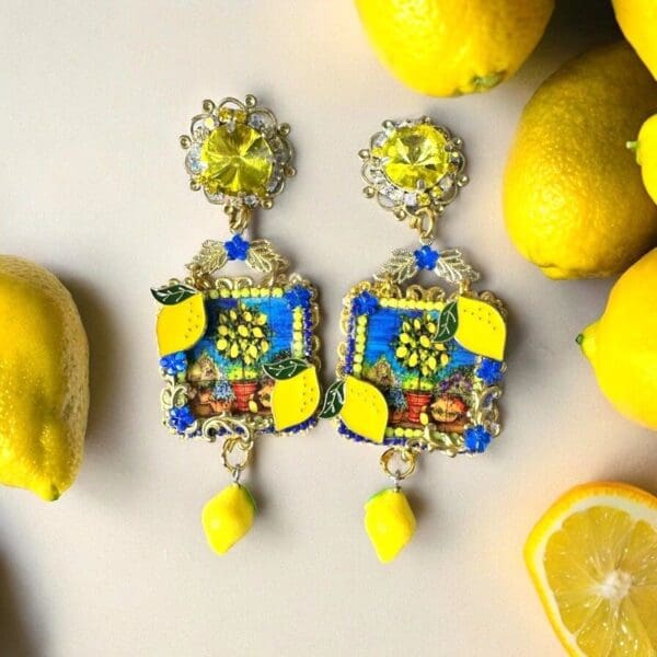 A pair of earrings sitting on top of a table.